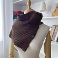 Dark brown ribbed knit wool neck warmer with a single button detail on a mannequin - Brown