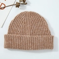 Brown knit wool beanie featuring a thick ribbed texture and wide cuffed brim for winter - Tan
