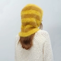 Yellow and orange striped balaclava faux fur hat worn from back view for winter warmth - Marigold Yellow