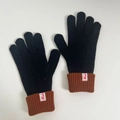Women's black knit wool gloves with brown ribbed cuffs and brand label tag - Black