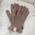 Brown wool knit gloves with ribbed cuffs and red logo label on a beige background - Dark Khaki