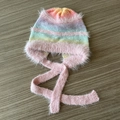 Charming gradient rainbow plush knit earflap hat with decorative pink braids and soft texture - Rainbow