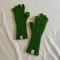 Women's warm wool knit gloves in vibrant grass green with a minimalist white brand tag - Pine Green