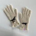 Elegant cream wool knit gloves with black bows and decorative buttons for winter - Ivory