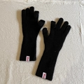 Women's warm black wool knit gloves with white Mula brand label on ribbed cuff - Black