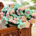 Handmade crochet floral blanket with pink and mint green 3D knit roses in a basket - Pale Pink and Pale Green Flowers