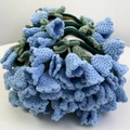 Handmade crochet Lily of the Valley flower hair tie in light blue and green colors - Blue Lily of the Valley