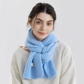Soft light blue knit scarf with ribbed texture and woven label for winter warmth - Sky Blue
