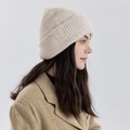 Thick beige ribbed knit beanie with folded brim for winter warmth and casual style - Milk White