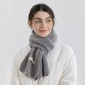 Chic grey ribbed knit scarf with woven label and soft cashmere-like texture for winter - Elegant Grey