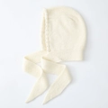 Elegant cream knit bonnet with white pearl trim and cozy ear protection straps - Milk White