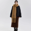 Elegant camel wool blend scarf with fringe details styled with a black quilted jacket - Extended Version / Yellow Coffee