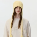 Light yellow knit trapper hat with long braided tassels and ear flaps for winter warmth - Lemon Yellow