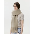 Chic beige wool blend scarf with fringe detail on a female model for winter warmth - Light Khaki