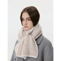 Beige wool blend knit scarf with thick ribbed texture worn over a grey winter coat - Off White