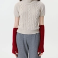 Winter knitted fingerless arm warmers in deep red color paired with a beige cable sweater - Lava Red