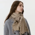 Classic camel wool blend knitted scarf with long tassels paired with grey winter overcoat - Camel