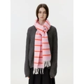 Pink and orange striped wool blend scarf with white tassels worn with a grey knit sweater - Pink Red Striped