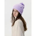 Light purple ribbed knit beanie featuring a matching fluffy pompom and metal emblem - Smoky Purple