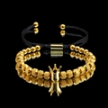 Bracelet cordon noir réglable avec pendentif couronne dorée et perles métalliques - Doré