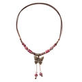 Collana a farfalla retrò con perle di ceramica rossa e accenti in metallo bronzo - Farfalla