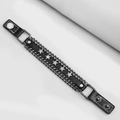 Punk-Lederarmband in Schwarz mit silbernen Sternen, Metallketten und Druckknöpfen - Schwarz