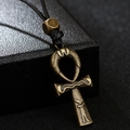 Vintage bronze Egyptian Ankh cross pendant necklace with black woven cord on leather - Antique Bronze