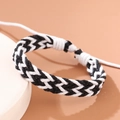 Handcrafted black and white braided rope bracelet with adjustable minimalist design - Black And White Woven (BRA385)
