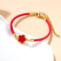 Bracciale a cordino rosso intrecciato con ciondolo quadrifoglio oro 18k donna - Rosso