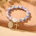 Ceramic beaded religious bracelet with blue floral patterns, baroque pearl and cross charm - Cross Style