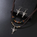 Collana con pendente a testa di mucca vintage con perline di legno e corda intrecciata - Set Collana e Orecchini Testa di Toro