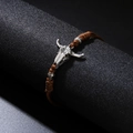 Bracciale religioso intrecciato a mano con teschio di toro vintage e cordino marrone - Marrone