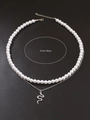 Dettaglio collana a doppio strato con perle e pendente a serpente, lunghezza 51cm-56cm - Stile Pendente a Serpente Doppio Strato