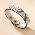 Bracciale in pelle con motivo a serpente e bottoni a pressione in metallo regolabili - Motivo Serpente Bianco e Nero (Stile 2)
