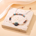 Boho-Armband mit Abalone-Muschel, Türkis-Perlen und verstellbarem Webband - Runde Abalone-Muschel