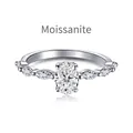 Elegant 0.8ct oval moissanite silver ring with marquise side stones on white background - US 5 / White Gold