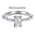 Classic S925 sterling silver ring with emerald cut moissanite and side stones - US 5 / White Gold