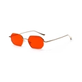 Retro octagonal metal sunglasses featuring vibrant orange-red lenses and golden frames - Gold Frame Red Lenses