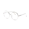 Occhiali vintage con ampia montatura rotonda in metallo argento e stanghette sottili - Argento