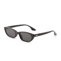 Fashionable black square cat-eye sunglasses with silver metal temples on white background - Bright Black / Gray