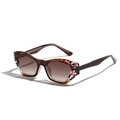 Cat-eye TR90 sunglasses in brown tortoiseshell with red and blue wavy pattern accents - Floral Gradient Tea