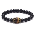 Elastic beaded bracelet with matte black onyx stones and a golden crown tiger eye charm - Matte Black