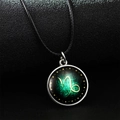 Glow-in-the-dark Capricorn constellation necklace with green nebula pendant and black cord - Capricorn