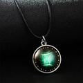 Luminous Gemini zodiac necklace with silver frame and green nebula glass pendant - Gemini