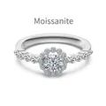 Elegant S925 sterling silver ring featuring a 0.86CT moissanite center stone and pave setting - US 5 / Silver-tone (DO120047-S-W-WH)