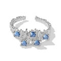 Anillo ajustable de plata S925 con texturas irregulares y cinco circonitas azules - Abierto Ajustable / Plateado