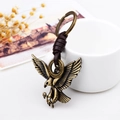 Portachiavi classico con aquila in metallo bronzo e cinturino in pelle intrecciata - Bronzo Antico