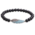 Pulsera de cuentas negras mate con dije de ala bañado en cobre e incrustaciones - Negro Mate