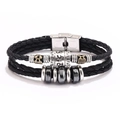Pulsera doble de cuero trenzado negro con cuentas de metal vintage y cierre de acero - Hematita