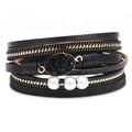 Bracelet multicouche en cuir noir avec chaînes dorées, pierre en résine et perles blanches - Noir